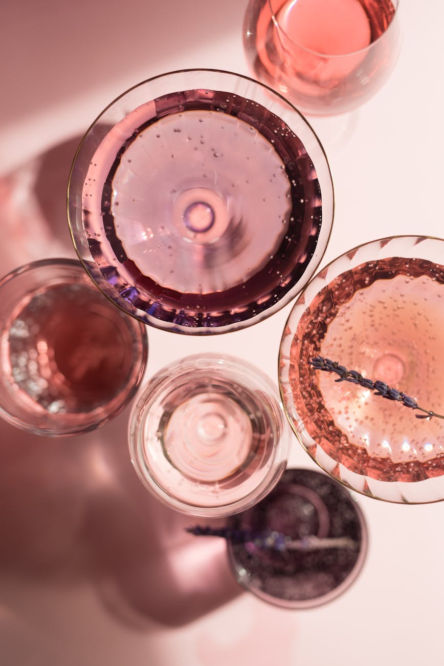 variety of alcoholic beverages on glasses